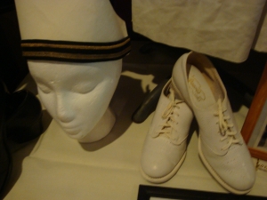 The hat and shoes of a WWII nurse.
